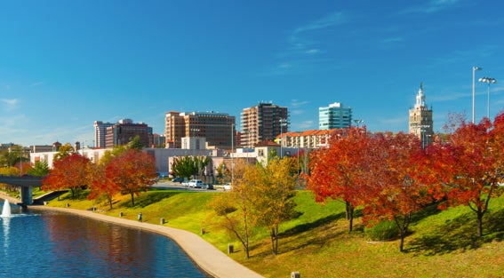 View of Country Club Plaza District and Brush Creek in Kansas City during Fall.
